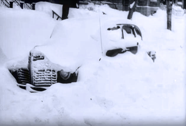 car buried in snow
